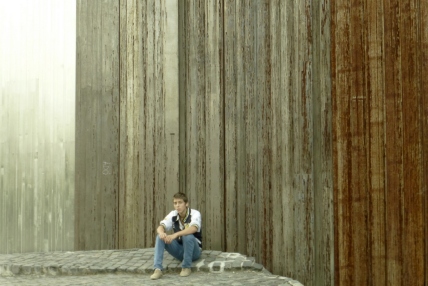 Figure 7: Man sitting beside the Monument.